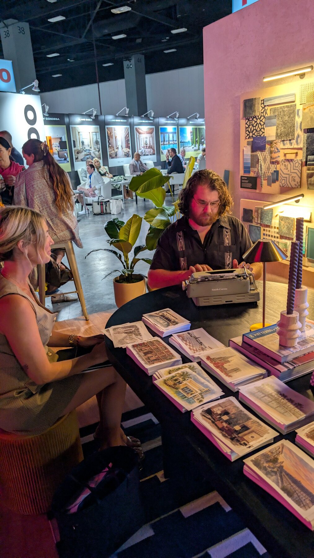 Chris writing at the Kimpton event during LE Miami